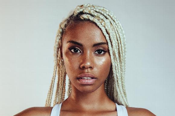Woman with bleached box braids